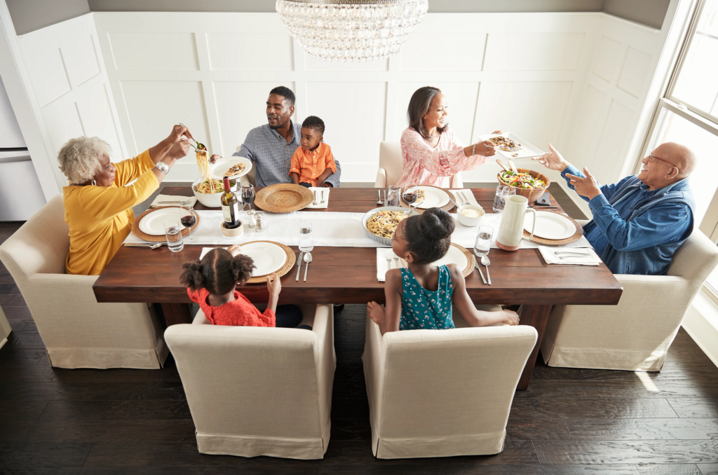 Family having breakfast at the dining table | Yuma Carpets & Tile Inc